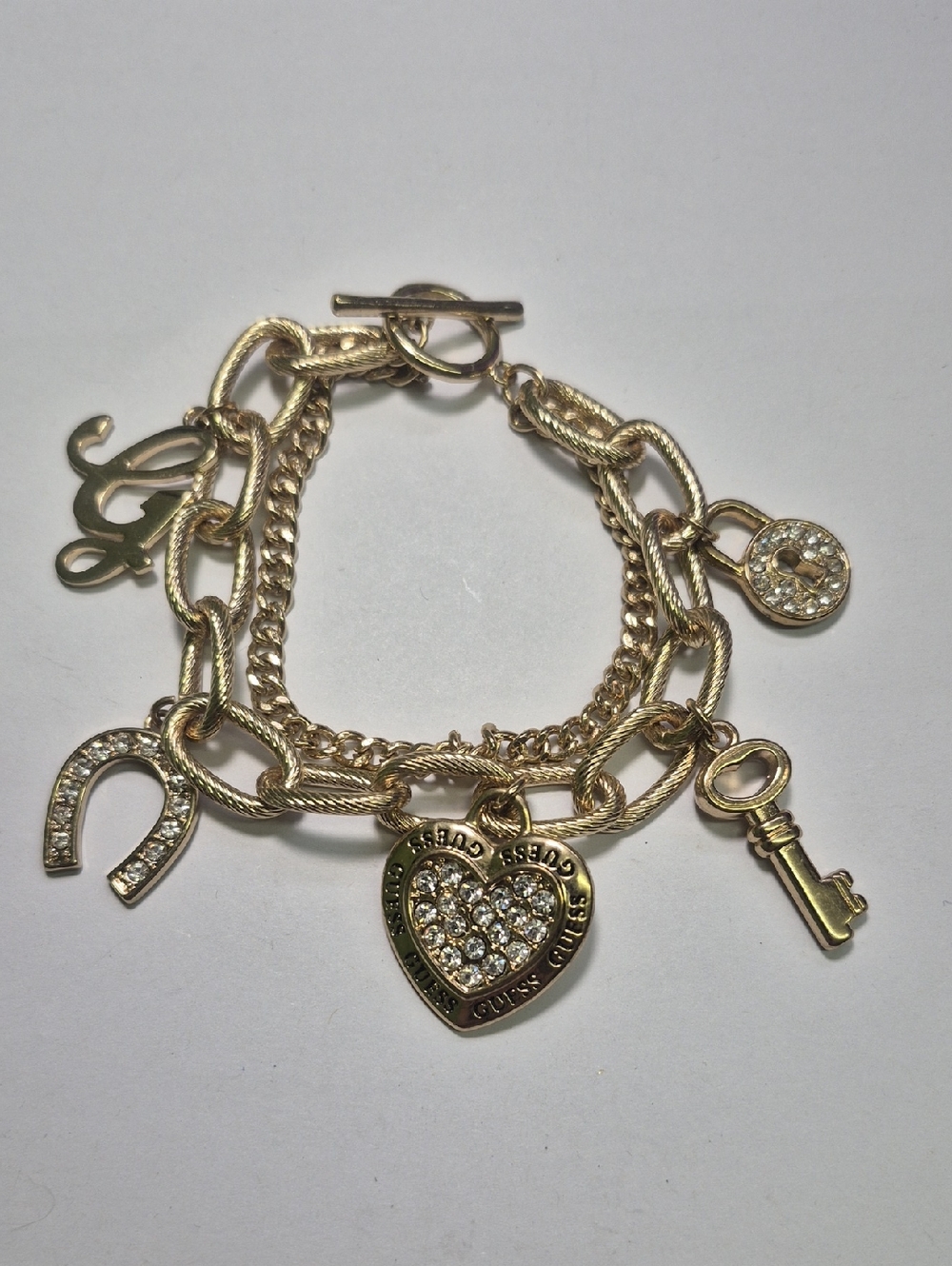 Guess Gold-Tone Heart Charm 8" Bracelet with Crystal Accents - Women's Jewelry
